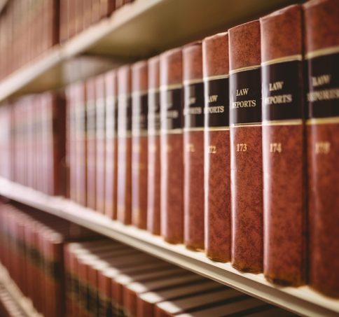 Close up of a lot of law reports in library